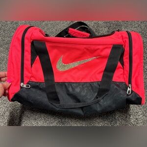 Nike pink duffle bag with rhinestone logo